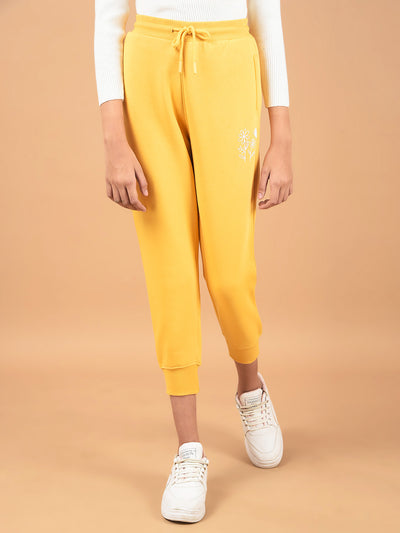Mustard Floral Print Joggers-Girls Joggers-Crimsoune Club