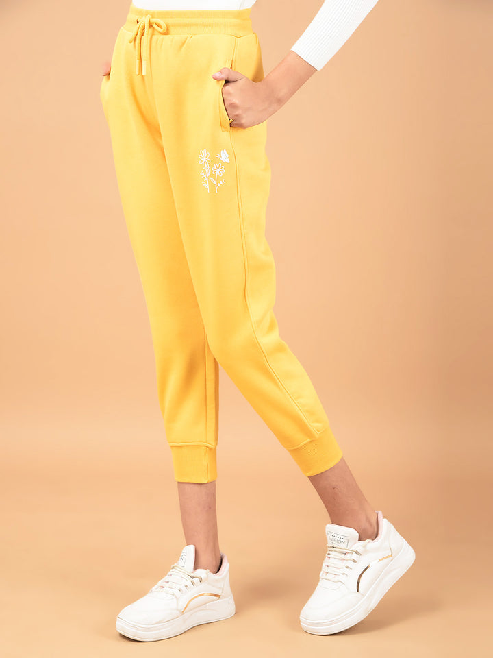 Mustard Floral Print Joggers-Girls Joggers-Crimsoune Club