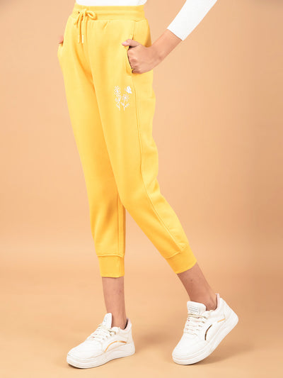 Mustard Floral Print Joggers-Girls Joggers-Crimsoune Club