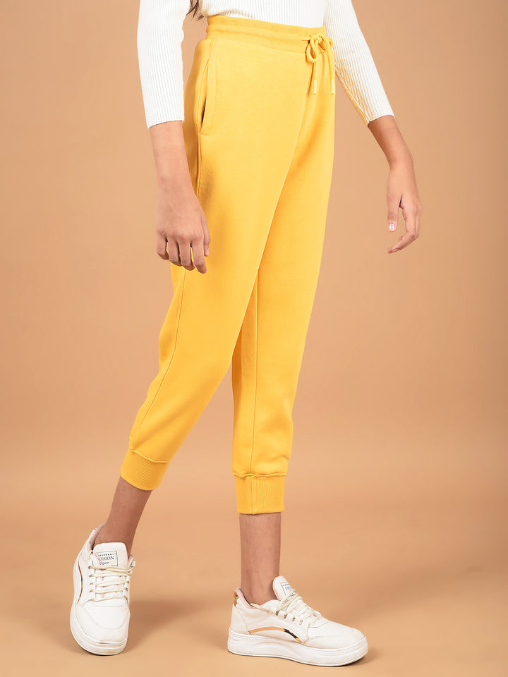 Mustard Floral Print Joggers-Girls Joggers-Crimsoune Club