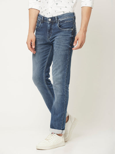  Light Wash Jeans with Leather Logo Patch 