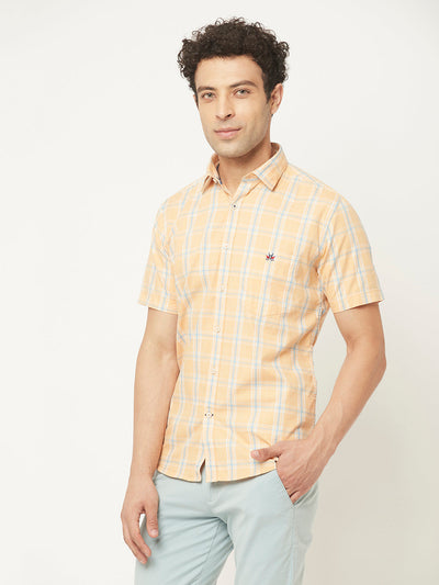   Short-Sleeved Peach Shirt in Checks