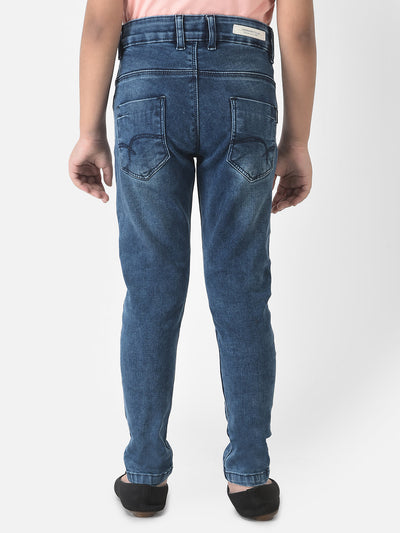  Blue Jeans with Logo Embellishment 