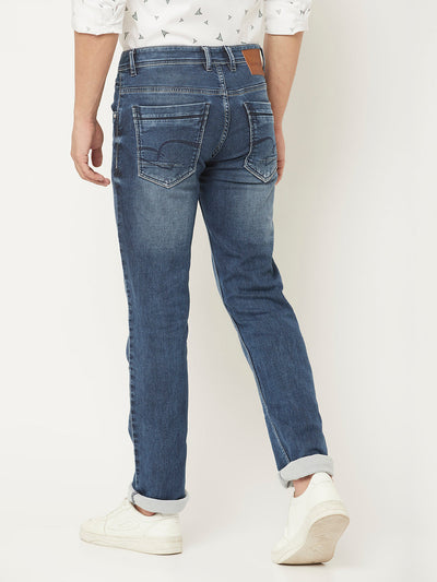  Light Wash Jeans with Leather Logo Patch 