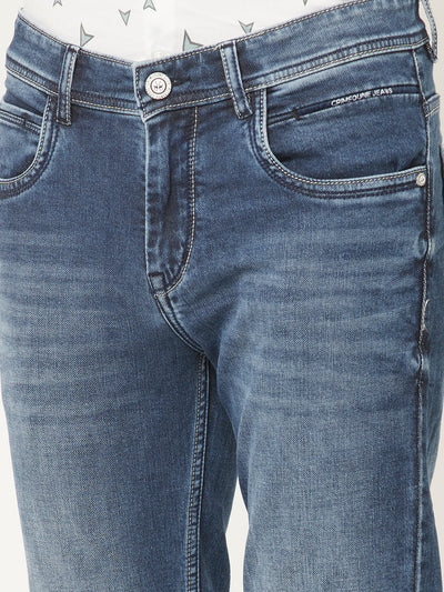  Light Wash Jeans with Leather Logo Patch 