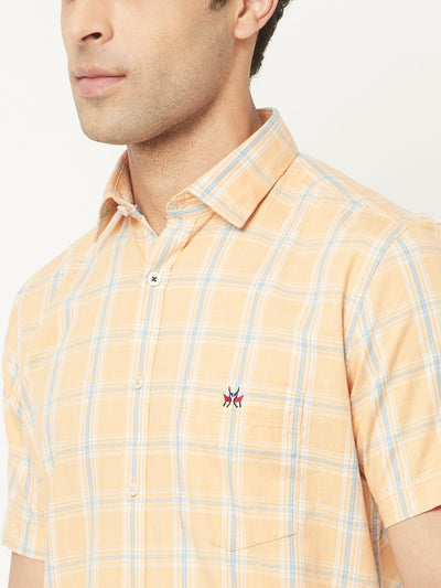   Short-Sleeved Peach Shirt in Checks
